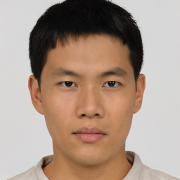 Neutral asian young-adult male with short  brown hair and brown eyes