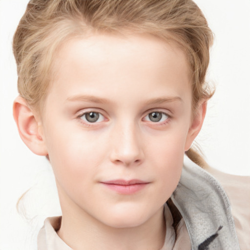 Joyful white child female with short  brown hair and blue eyes