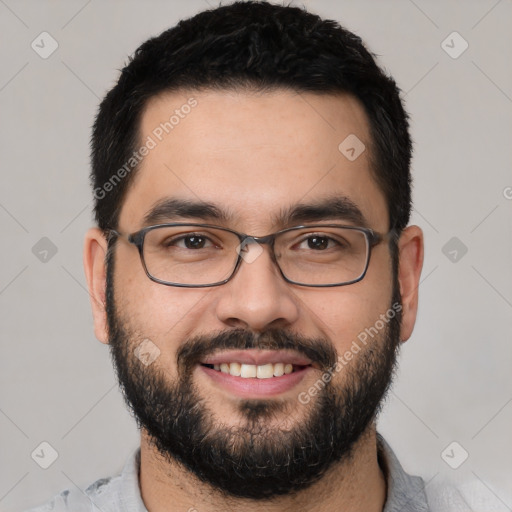 Joyful white young-adult male with short  black hair and brown eyes