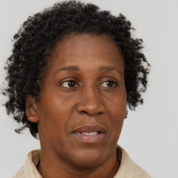 Neutral black adult female with short  brown hair and brown eyes