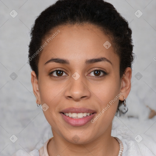 Joyful latino young-adult female with short  brown hair and brown eyes