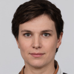 Neutral white young-adult female with short  brown hair and brown eyes