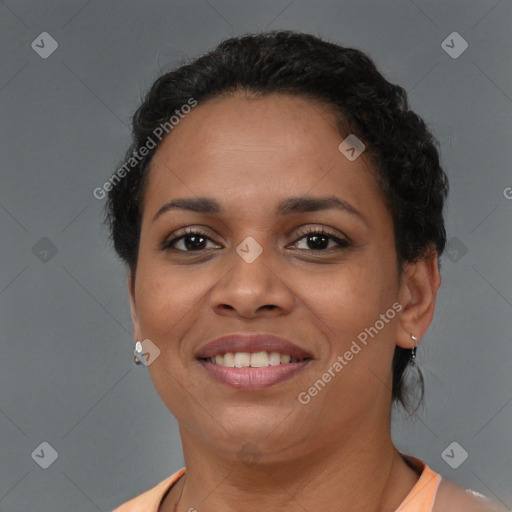 Joyful latino young-adult female with short  brown hair and brown eyes