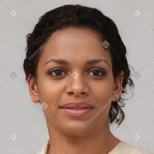 Joyful latino young-adult female with short  brown hair and brown eyes