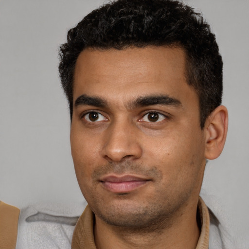 Neutral white young-adult male with short  black hair and brown eyes