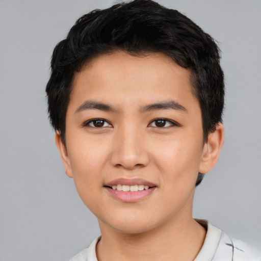 Joyful asian young-adult male with short  black hair and brown eyes