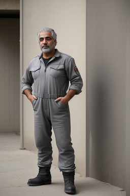 Iraqi middle-aged male with  gray hair