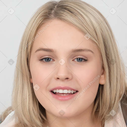 Joyful white young-adult female with long  brown hair and blue eyes