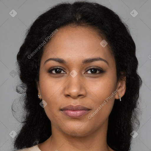 Joyful black young-adult female with long  brown hair and brown eyes