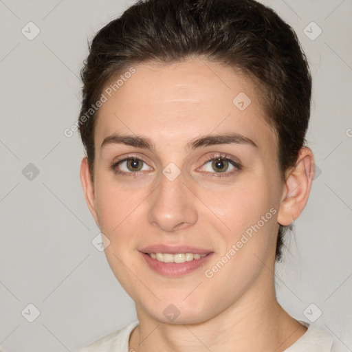 Joyful white young-adult female with medium  brown hair and brown eyes