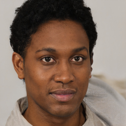 Neutral black young-adult male with short  brown hair and brown eyes
