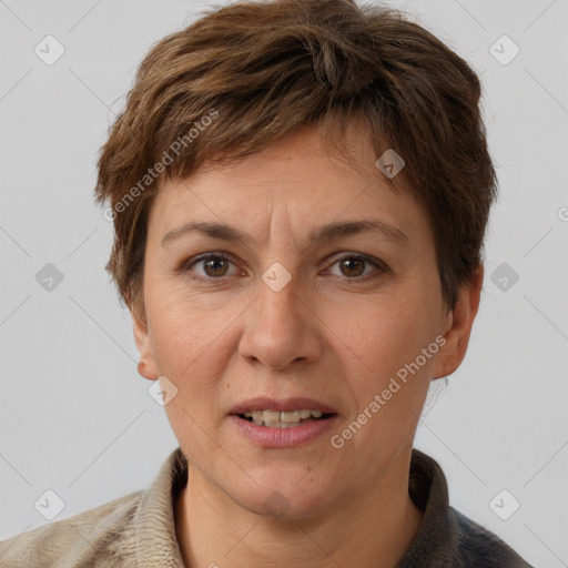 Joyful white adult female with short  brown hair and brown eyes