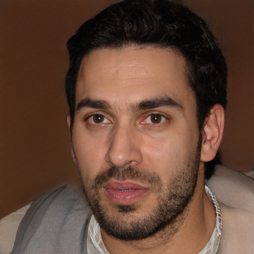 Neutral white young-adult male with short  black hair and brown eyes