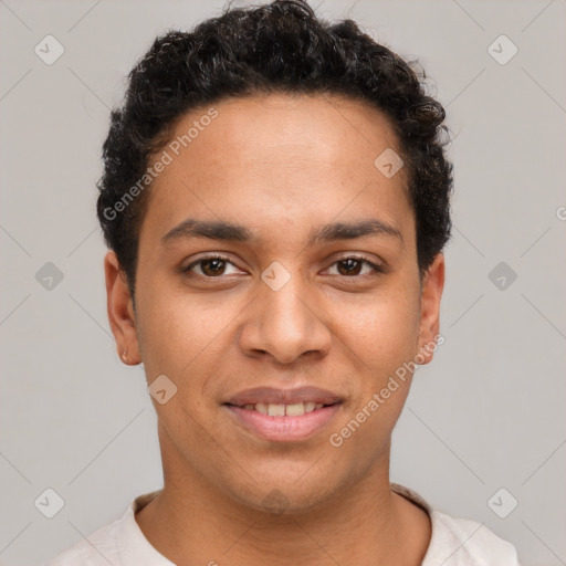 Joyful latino young-adult male with short  brown hair and brown eyes