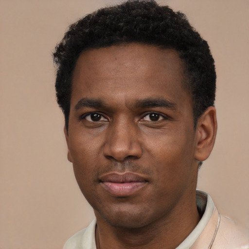Neutral black young-adult male with short  black hair and brown eyes