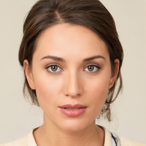 Neutral white young-adult female with medium  brown hair and brown eyes