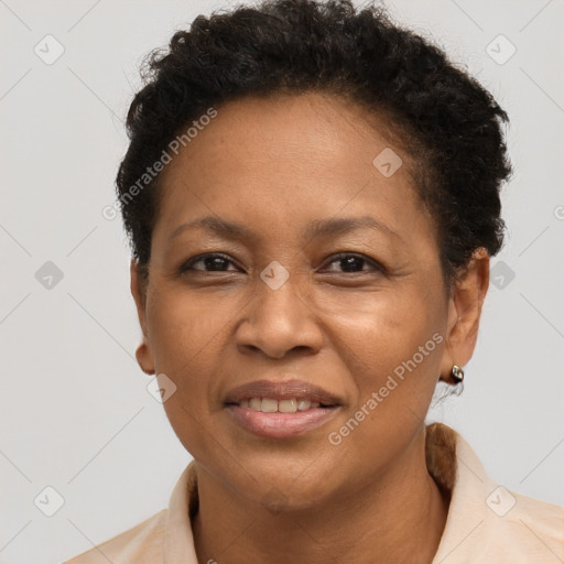 Joyful latino adult female with short  brown hair and brown eyes