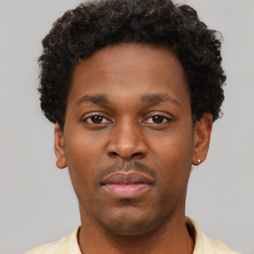 Neutral black young-adult male with short  brown hair and brown eyes