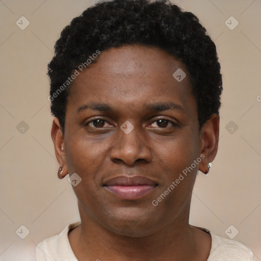 Joyful black young-adult male with short  brown hair and brown eyes