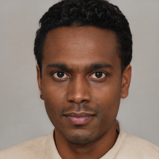 Neutral black young-adult male with short  black hair and brown eyes