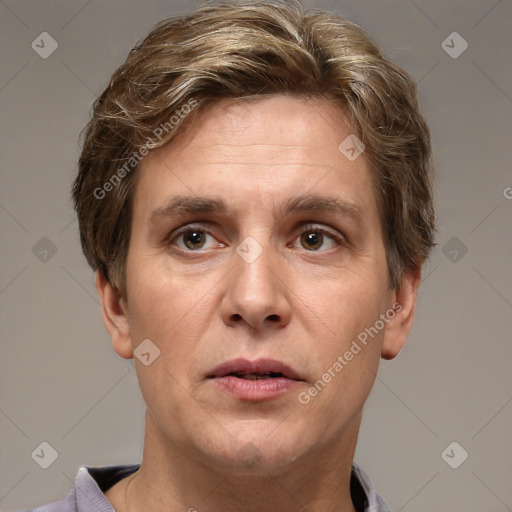 Joyful white adult male with short  brown hair and grey eyes