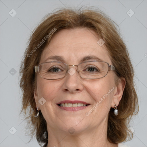 Joyful white middle-aged female with medium  brown hair and grey eyes