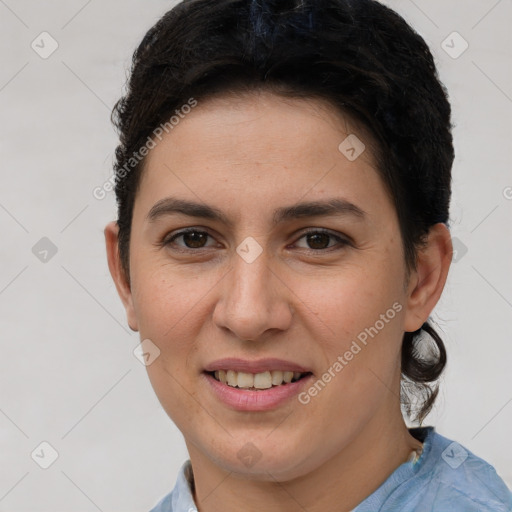 Joyful white young-adult female with short  brown hair and brown eyes