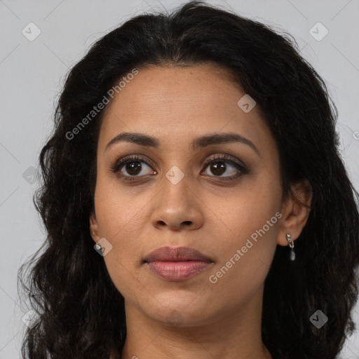 Joyful latino young-adult female with long  brown hair and brown eyes