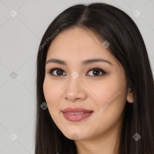 Joyful white young-adult female with long  brown hair and brown eyes