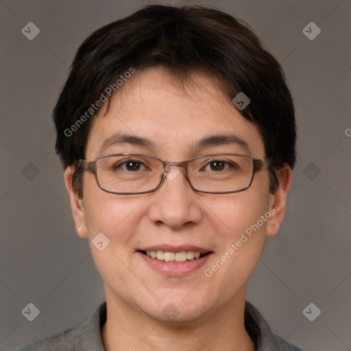 Joyful white adult female with short  brown hair and brown eyes