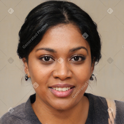 Joyful black young-adult female with medium  black hair and brown eyes