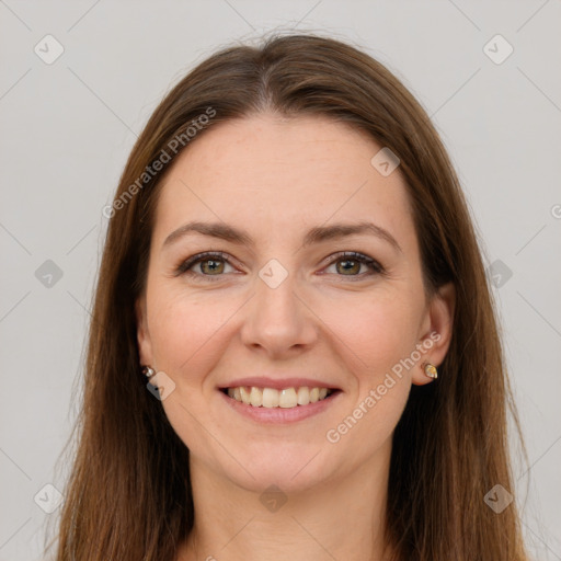 Joyful white young-adult female with long  brown hair and grey eyes