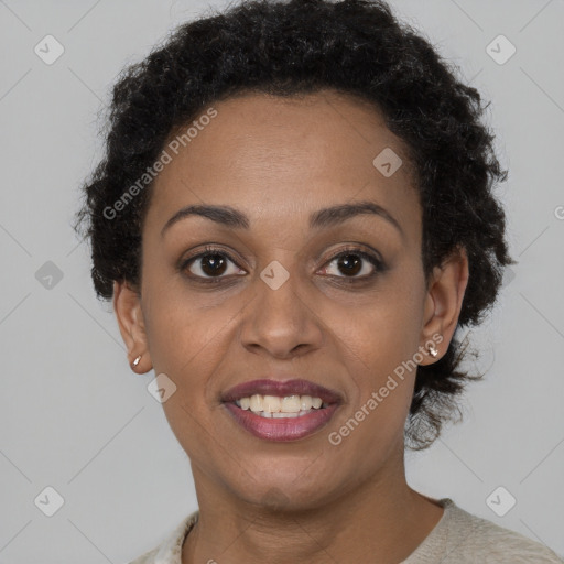 Joyful black young-adult female with short  brown hair and brown eyes