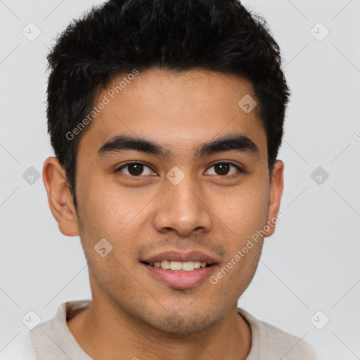 Joyful latino young-adult male with short  brown hair and brown eyes