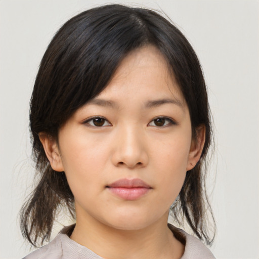 Neutral asian young-adult female with medium  brown hair and brown eyes