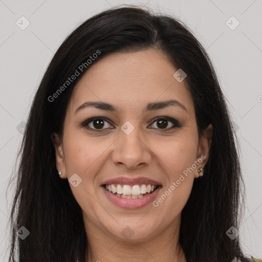 Joyful latino young-adult female with long  brown hair and brown eyes