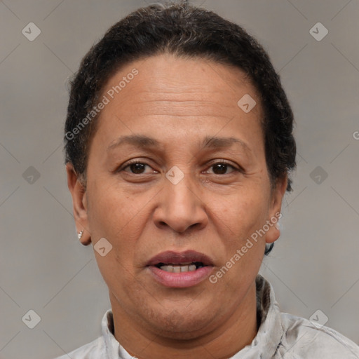 Joyful white adult female with short  brown hair and brown eyes