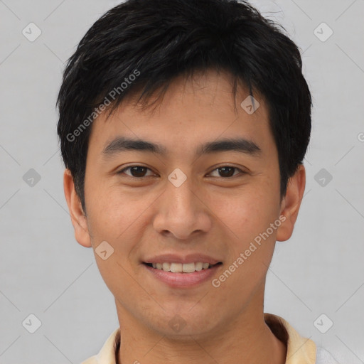 Joyful asian young-adult male with short  black hair and brown eyes