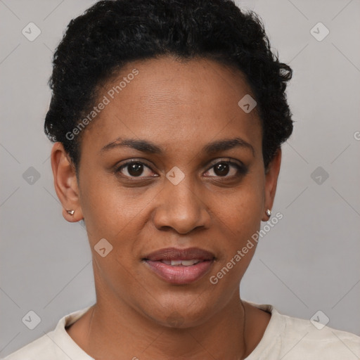 Joyful black young-adult female with short  brown hair and brown eyes