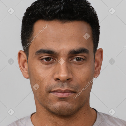 Neutral latino young-adult male with short  black hair and brown eyes