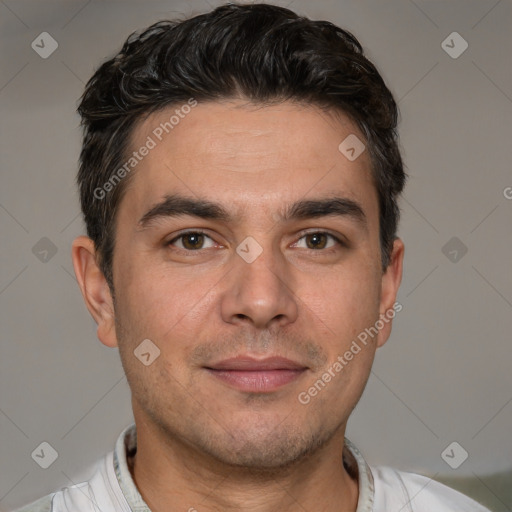 Joyful white adult male with short  brown hair and brown eyes