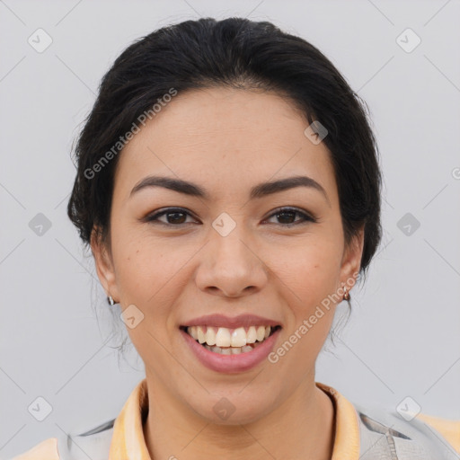 Joyful latino young-adult female with medium  brown hair and brown eyes