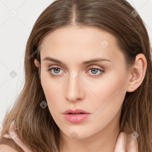 Neutral white young-adult female with long  brown hair and grey eyes