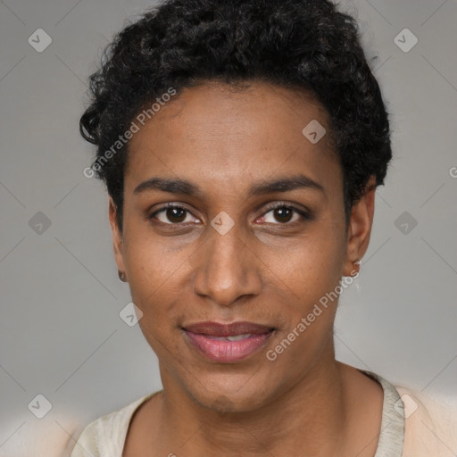 Joyful black young-adult female with short  black hair and brown eyes