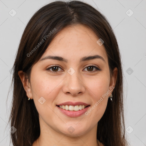 Joyful white young-adult female with long  brown hair and brown eyes