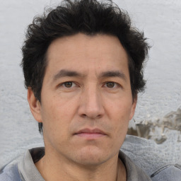 Neutral asian adult male with short  brown hair and brown eyes