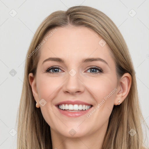 Joyful white young-adult female with long  brown hair and blue eyes