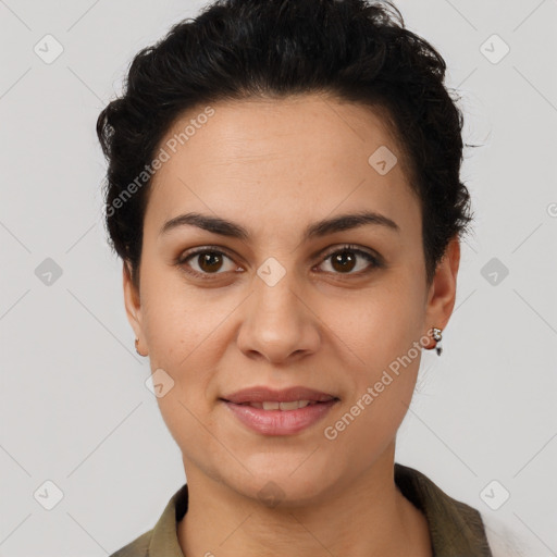 Joyful latino young-adult female with short  brown hair and brown eyes