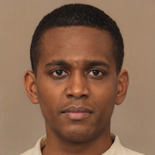 Neutral latino young-adult male with short  brown hair and brown eyes