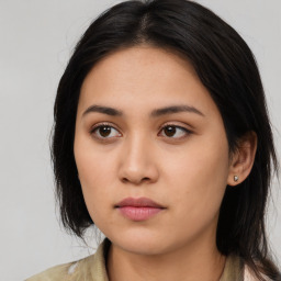 Neutral asian young-adult female with long  brown hair and brown eyes